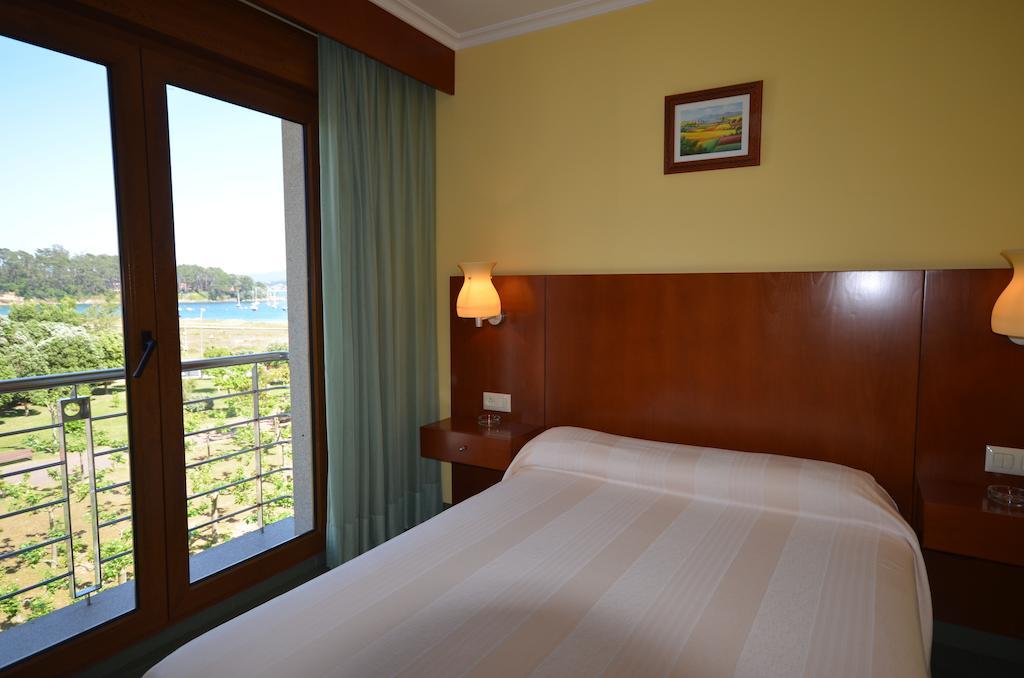 Hotel Maracaibo Portonovo Chambre photo