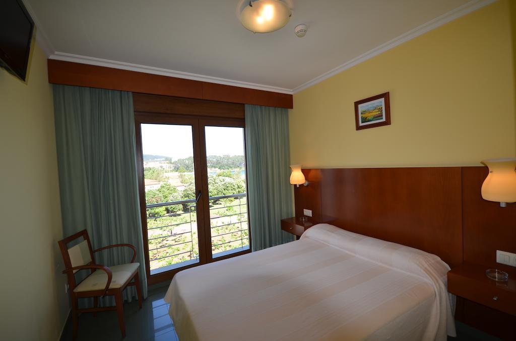 Hotel Maracaibo Portonovo Chambre photo